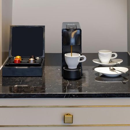 Melia Vinpearl Hue Otel Dış mekan fotoğraf A Nespresso coffee machine in a hotel room