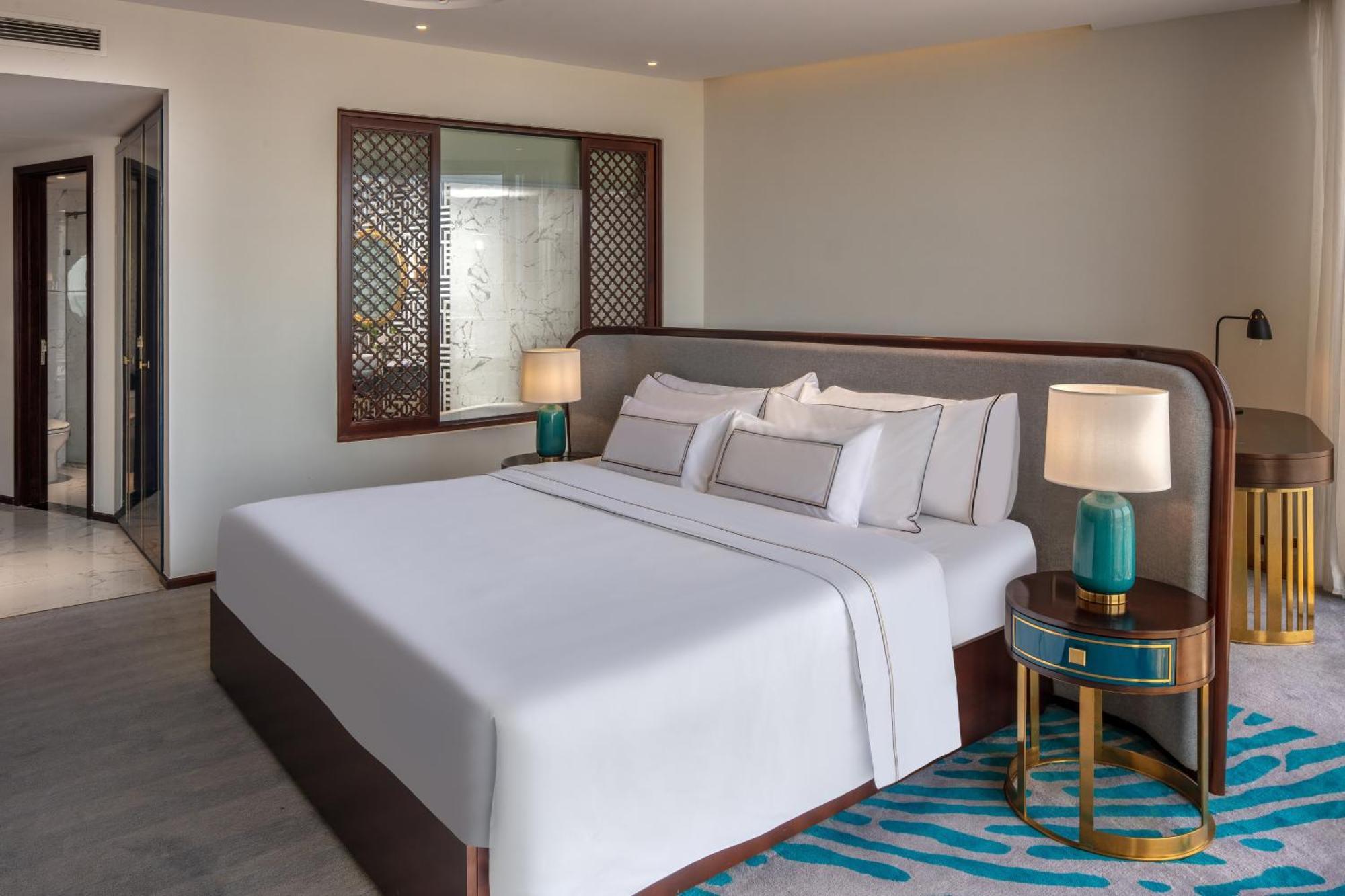 Melia Vinpearl Hue Otel Oda fotoğraf A bedroom at the hotel
