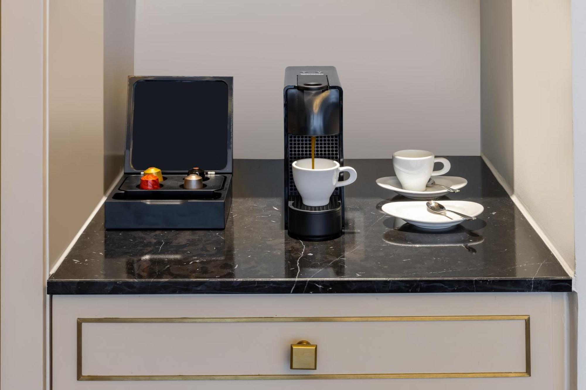 Melia Vinpearl Hue Otel Dış mekan fotoğraf A Nespresso coffee machine in a hotel room